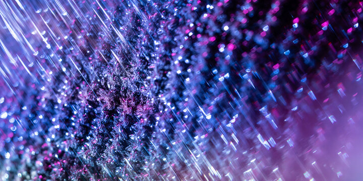 Abstract purple and blue glitter rain light background