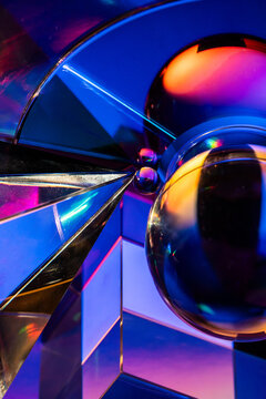Futuristic abstract glass spheres with neon reflections