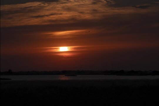 Red Sunset Over the Sea Timelapse