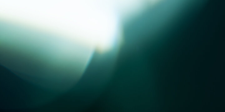 Abstract teal light and shadow background with copy space