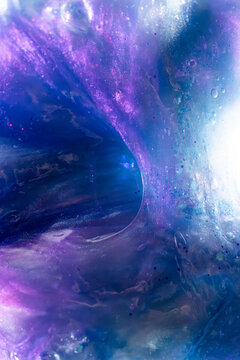 Abstract cosmic nebula in violet and blue light