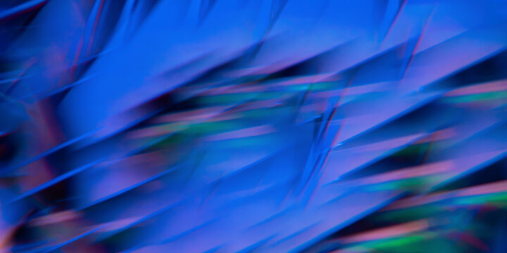 Abstract blue motion blur with iridescent light streaks
