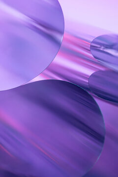 Abstract purple metallic cylinders with curved reflective forms