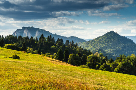 Scenic Pieniny mountains landscape with rolling green hills and dramatic clouds