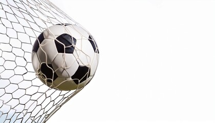 Fototapeta premium soccer ball in goal net isolated on white or white background
