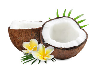 Coconut halves, plumeria flowers and green palm leaves isolated on white © New Africa