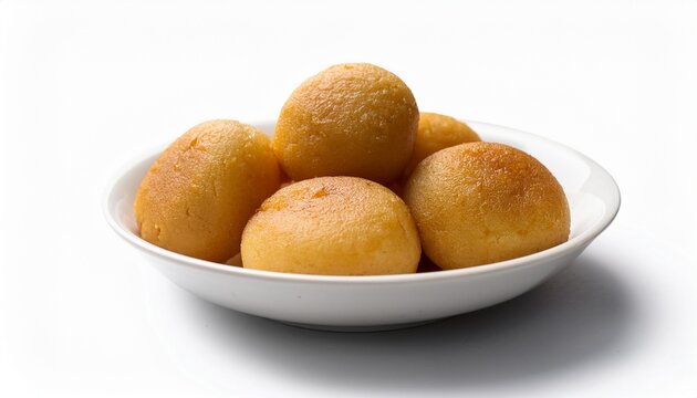 close up of traditional bengali sweet malpua pitha in a white bowl isolated on white background