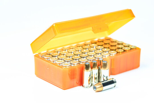 pack of bullet 9mm parabellum JHP ( Jacketed Hollow Point ) on white surface.