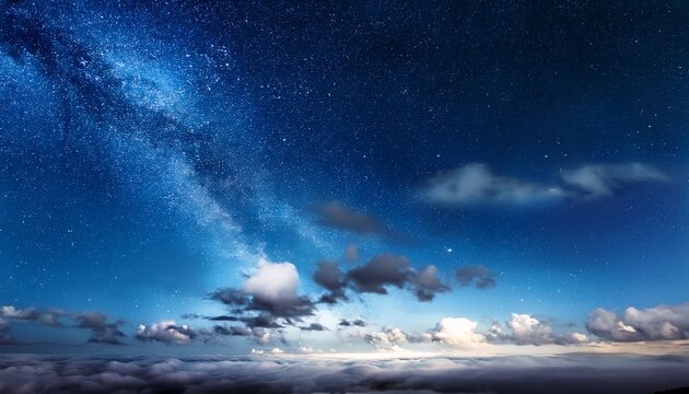 panoramic night sky with some clouds