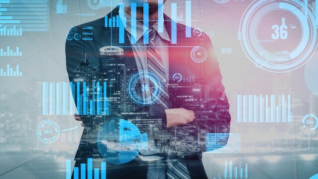 A professional businessman stands confidently with crossed arms, surrounded by digital graphs and data visualizations, highlighting modern business strategies in an urban setting. Xenic