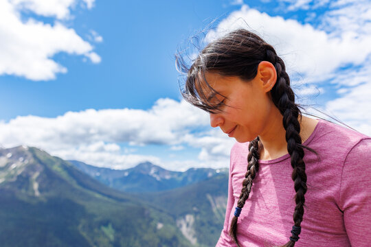 Woman hiker with braided hair in Manning Park, British Columbia