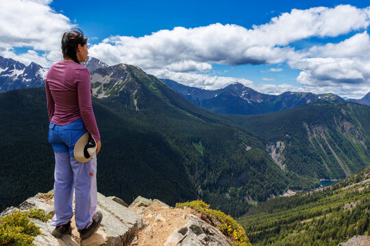 Woman admiring an alpine mountain view in Manning Park, British Columbia