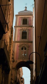 Ancient tower on street touristic of San Gregorio Armeno in Naples