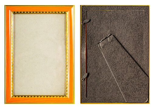 Isolated photo of orange plastic baroque picture frame on white background.