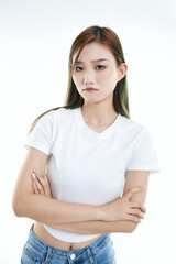 Fototapeta premium Cute and lively Asian girl against a white background