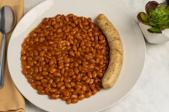 baked beans along with chicken sausage
