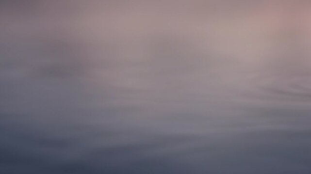 Moving abstract blurred gentle ripples on pale water background, slow calm gradient for calm breathing exercises