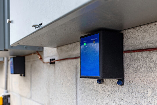 Whole house surge protective device installed on outdoor transfer switch electrical panel in USA