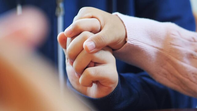 Group of people praying. Christian worship and pray. Christian group of people holding hands praying worships together to believe
