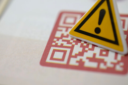 QR Code Scam Warning with Scan Now Message and Alert Sign