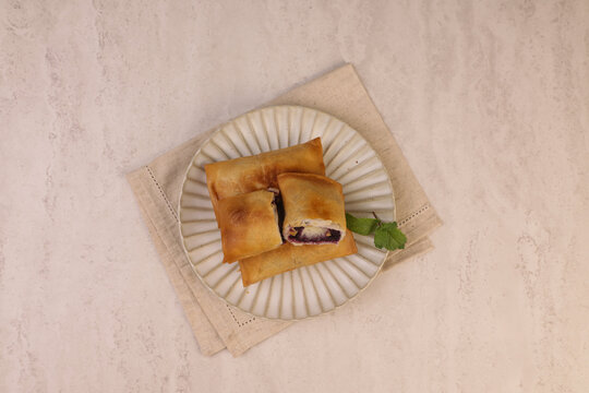 Goguma Pia or Pia Ubi is a flaky Indonesian pastry filled with smooth, naturally sweet purple yam or sweet potato paste. 
