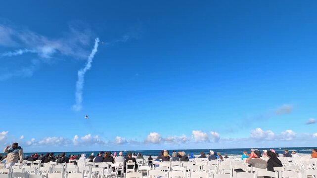 Spectators Watching Airshow Performance at Surfers Paradise Beach
