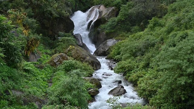 Scenery view of the waterfall from Langtang Khola river a river coming from the south flows down along the Langtang trekking route, Nepal. 