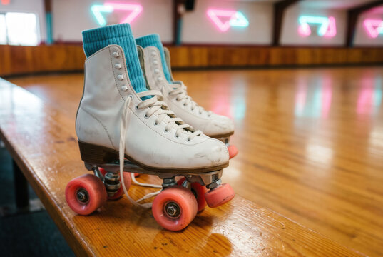 White Roller Skates with Turquoise Socks at a 1980s Style Rink