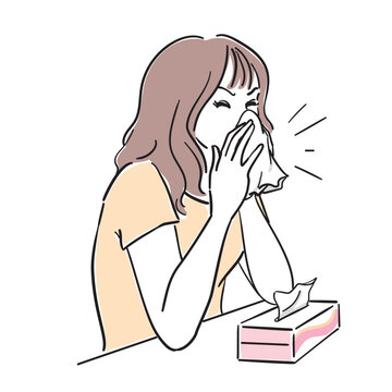 鼻をかむ女性　風邪花粉症の症状