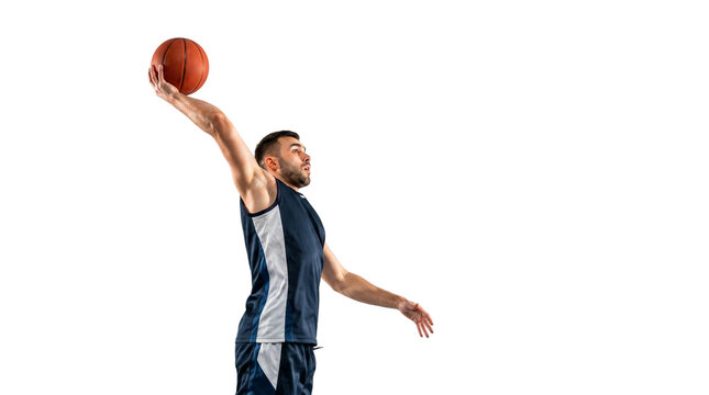 Caucasian man dunking basketball