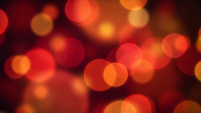 Fiery red and orange soft-focus circles shift through layered parallax with gentle light bloom, creating a warm mystical abstract background with smooth seamless motion.