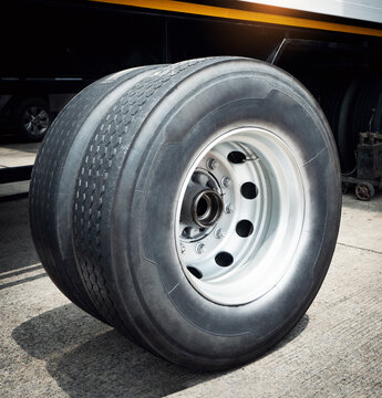 Big Truck Wheels, Truck Tires. Freight Transportation, Logistics Truck. Shipping Cargo Container.  Transportation Logistics Truck.	
