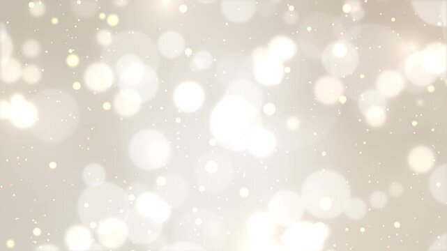 シルバーホワイト背景に舞い散る美しい玉ボケと輝く光の粒子のシームレスループ動画素材 / Glowing bokeh and shining light particles loop on silver white gradient background
