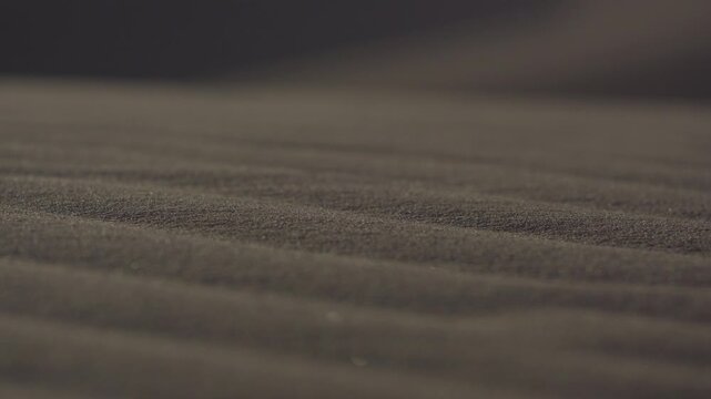 Close-up 4K high-resolution video of flawless sand tracks in the desert.