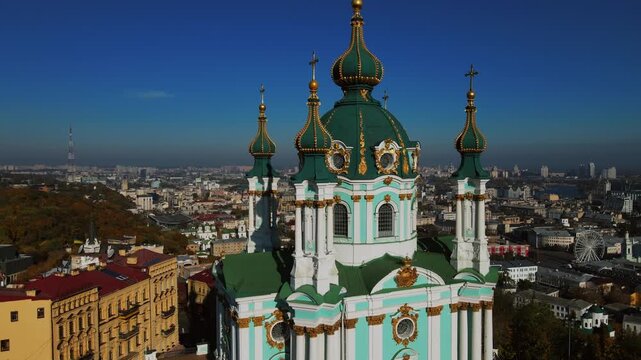 Aerial close up of turquoise baroque domes and golden spires in Kyiv