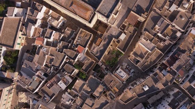Bird's eye drone view looking straight down at the historic buildings and the Cathedral of Otranto in the Puglia region.