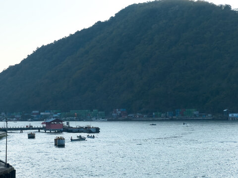 Coastal Harbor View With Mountain Background