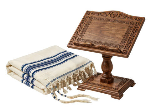 A wooden book stand with a jewish prayer shawl called a tallit on a flat surface