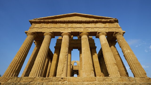 Evening light, super wide angle, oblique aerial view, front, Concordia Temple, valley of the temples, valle dei templi, Agrigento, Sicily, Italy