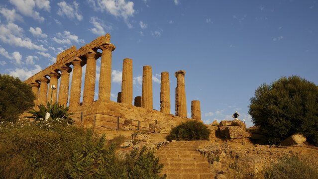 Evening light, super wide angle shot, Hera temple, visitors, valley of the temples, valle dei templi, Agrigento, Sicily, Italy