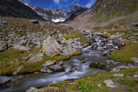 Mountain stream with &Ouml;tztal Alps, S&ouml;lden, &Ouml;tztal, Tyrol, Austria