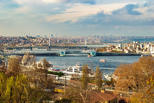 Scenic views across the Golden Horn in Istanbul, Turkiye; with Galata Bridge and Golden Horn Bridge (Hali&ccedil; K&ouml;pr&uuml;s&uuml;)