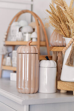 Boho autumn home decor with ceramic pumpkin jars