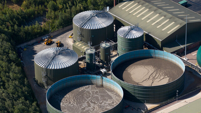 Biowaste treatment facility with storage tanks and digesters