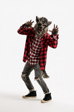 Werewolf Costume on White Background with Masked Man Wearing Red Plaid Shirt and Claws for Scary Halloween