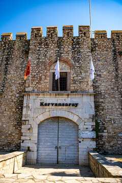 View of Okuz Mehmed Pasha Caravanserai entrance. Kusadasi, Turkiye - August 21, 2026.