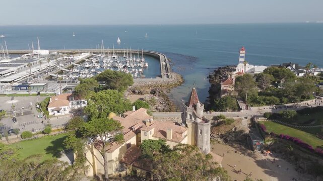 Aerial - Museu Condes de Castro Guimaraes, Santa Marta lighthouse and Cascais marina Portugal