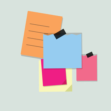 Colorful stacked sticky notes with binder clip