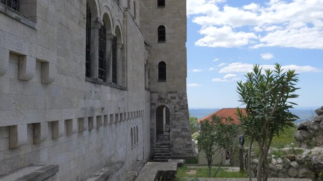 Kruje Fortress Albania limestone facade with arched windows and stairway above the valley