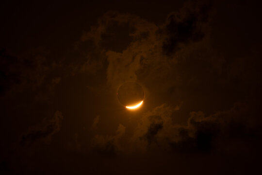Solar eclipse corona against dark space background